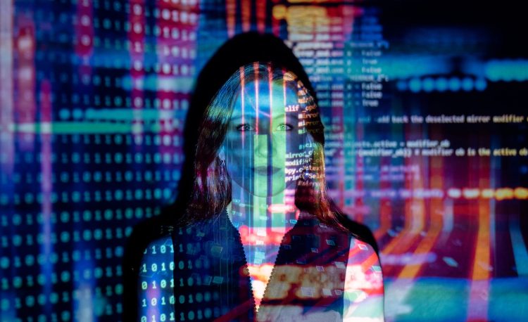 code projected over woman