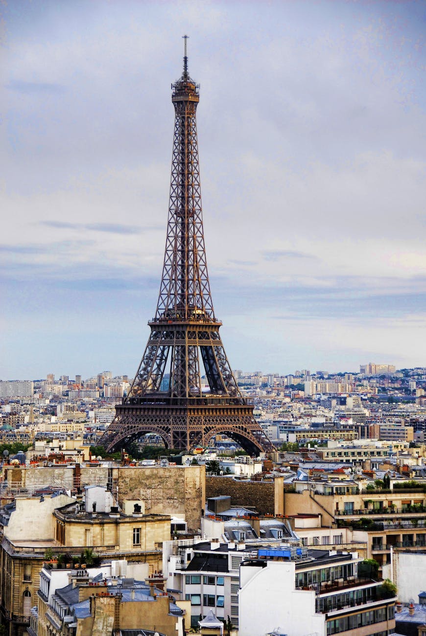 buildings city clouds eiffel tower