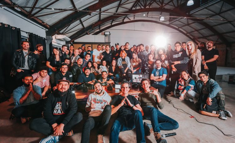 photo of people smiling and posing for a picture