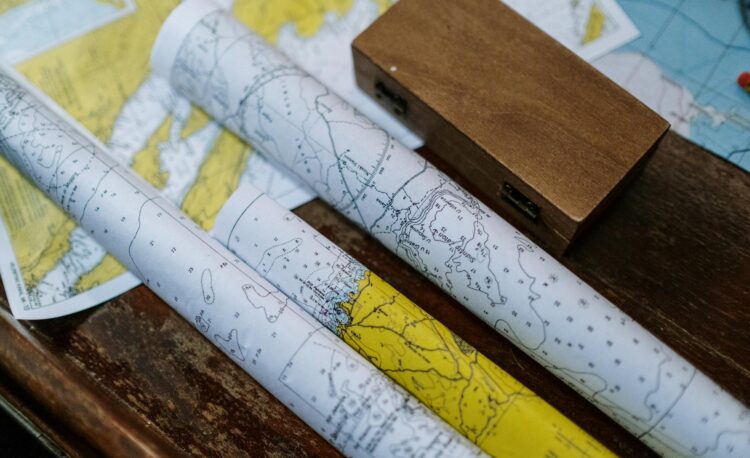 close up photo of rolled maps